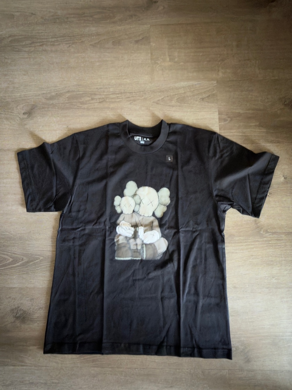Uniqlo x KAWS Black Tee with Beige Plush-Character Print